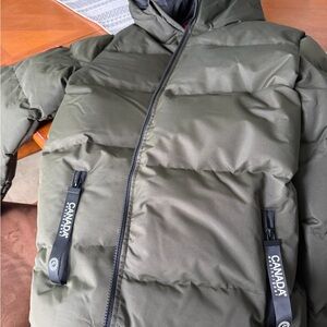 New without tag. Canada Goose Olive and Black Weather gear jacket. Unisex.